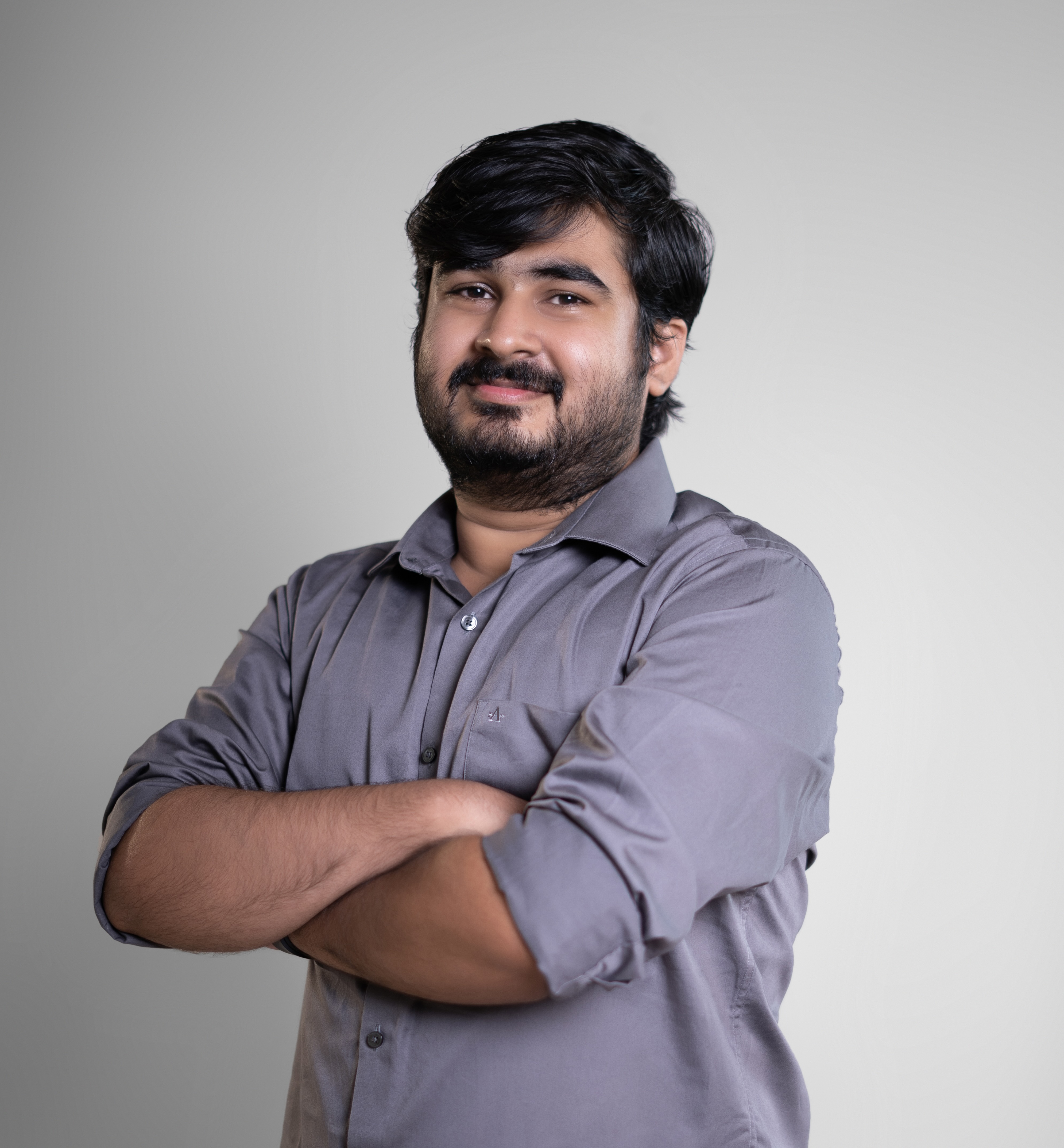 Himanshu Patil posing with folded hand